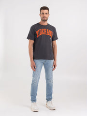 REPLAY T-SHIRT WITH DISTRESSED EFFECT AND RIDER PRINT